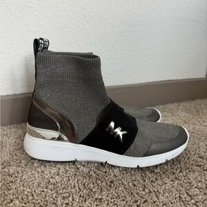 Michael Kors Knit Slip On Sneakers in Black, Silver, and White